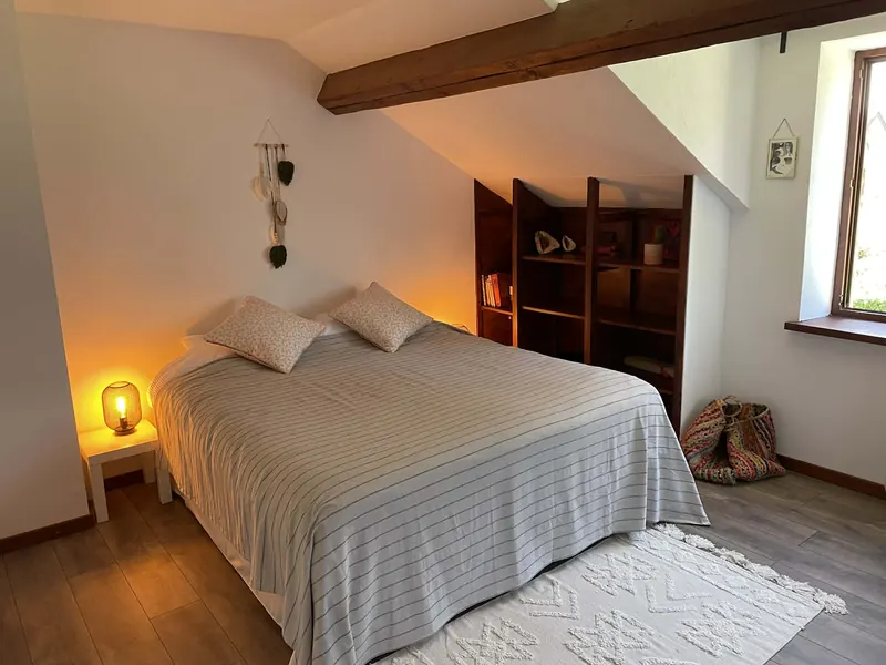 Master bedroom with Heavenly Bed and soft lighting
