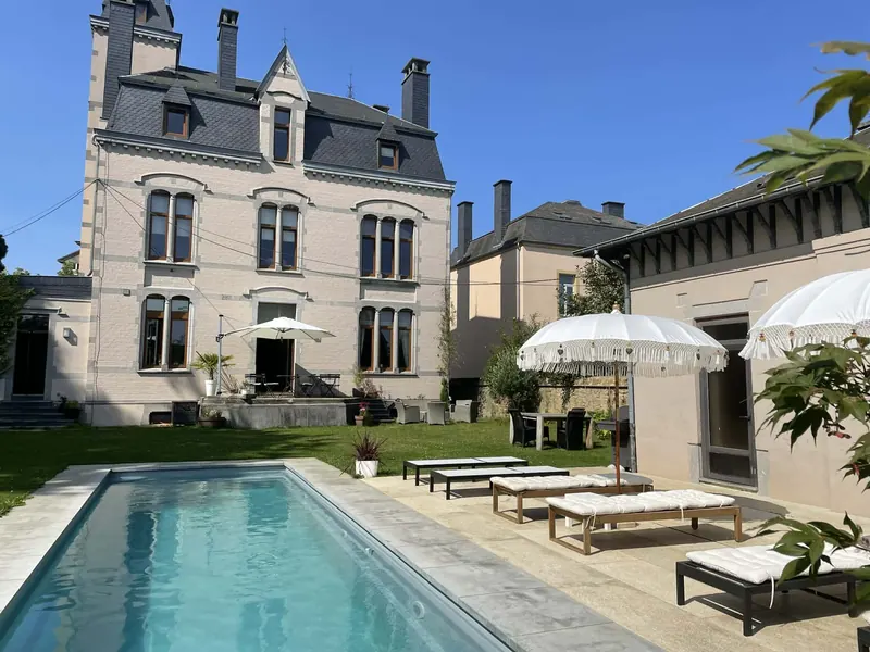 The heated pool in front of the Art Nouveau Villa O